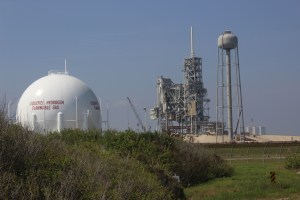 The launch pad and water tower being worked on by Space - X
