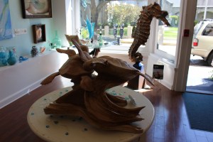 Beautiful wood sculpture of turtles was done from one piece (except for the flippers)