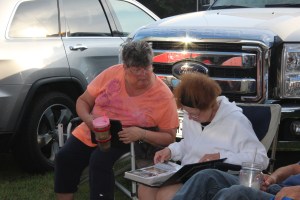 Diane and Jo looking at Alaska pictures