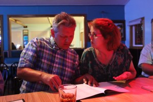 Lee and Kelly looking over the song list