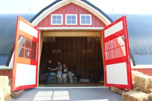 Katy and Micah talking to the owner James Jean (not making that up) in the barn. 