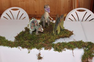 Micah loves dinosaurs and I was all about making that happen so this centerpiece (with some flowers that came later) was on the head table