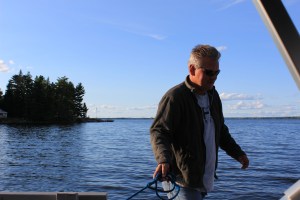 Lee walking the boat around the dock