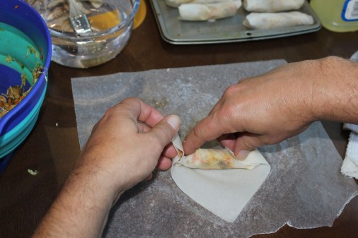 Roll towards you and tuck in ends