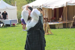 Pull extra on one side up (easier with two people)