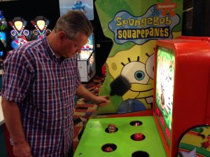 Lee playing Whack a Mole