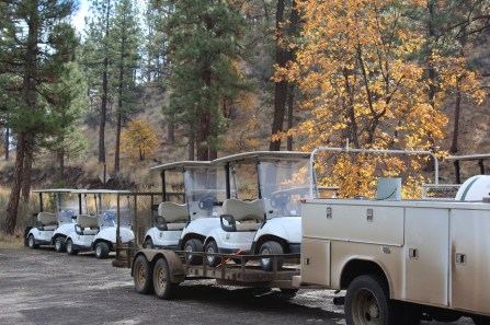Dropping off the golf carts that the local golf course generously donated