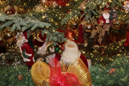 The tree was so big these santas and ornaments were all large size