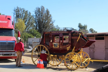 The Wells Fargo wagon is a coming down the street