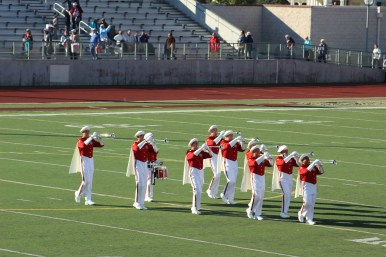 The heralds play 15 new compostions every year during the 5 mile parade march
