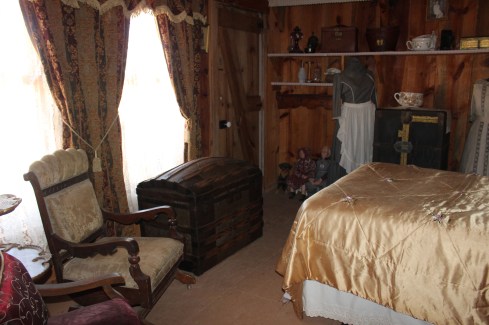 The old trunk in this bedroom was beautiful and has been in his family for over 100 years