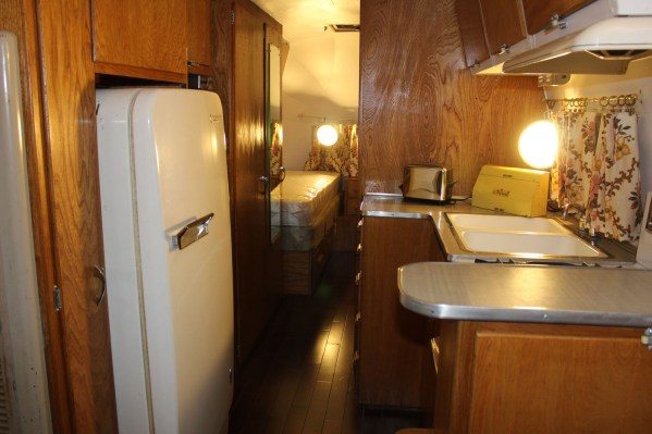 The inside of the aristream with a really nice fridge