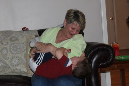 Mom playing with the baby