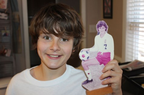 Alec holding a picture of his Aunt Tracy from high school. We even had the same hair!!