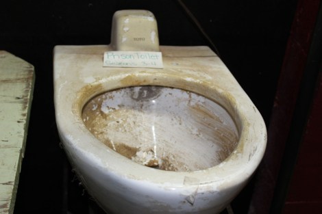 You can buy a toilet prop from the prison scene :)