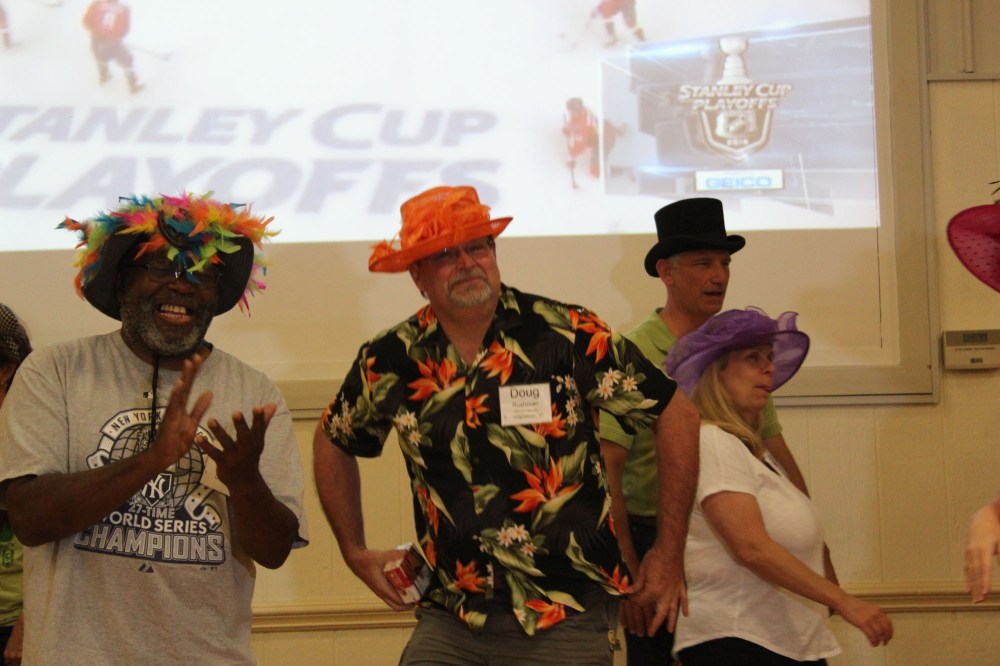 My absolute favorite hat from either rally. It takes a real man to wear a hat like that and see how it is color coordinate with his shirt. For the first time ever a man won most glamorous hat!