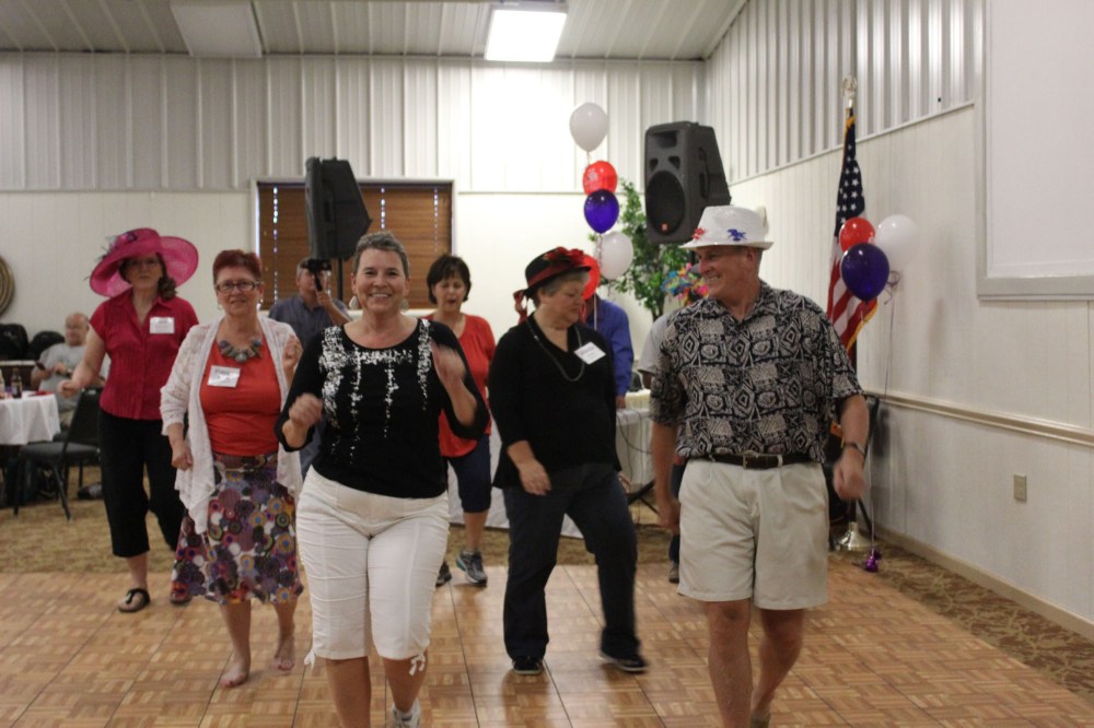 Linda and Howard leading the electric slide. Did you know Linda fell in love with Howard in high school because he could dance :)