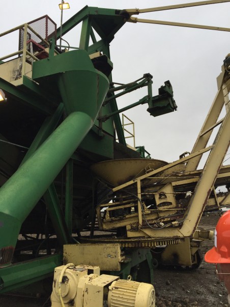 We push a button and the catcher comes out and grabs some beets