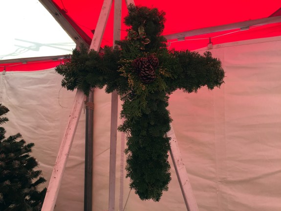 Beautiful cross wreaths. The pine cones and berries are all real. but so fresh they actually look fake