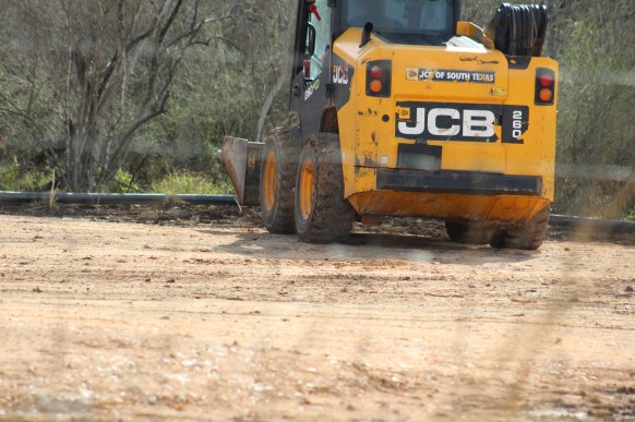 Then hose pushed into place vy a CAT